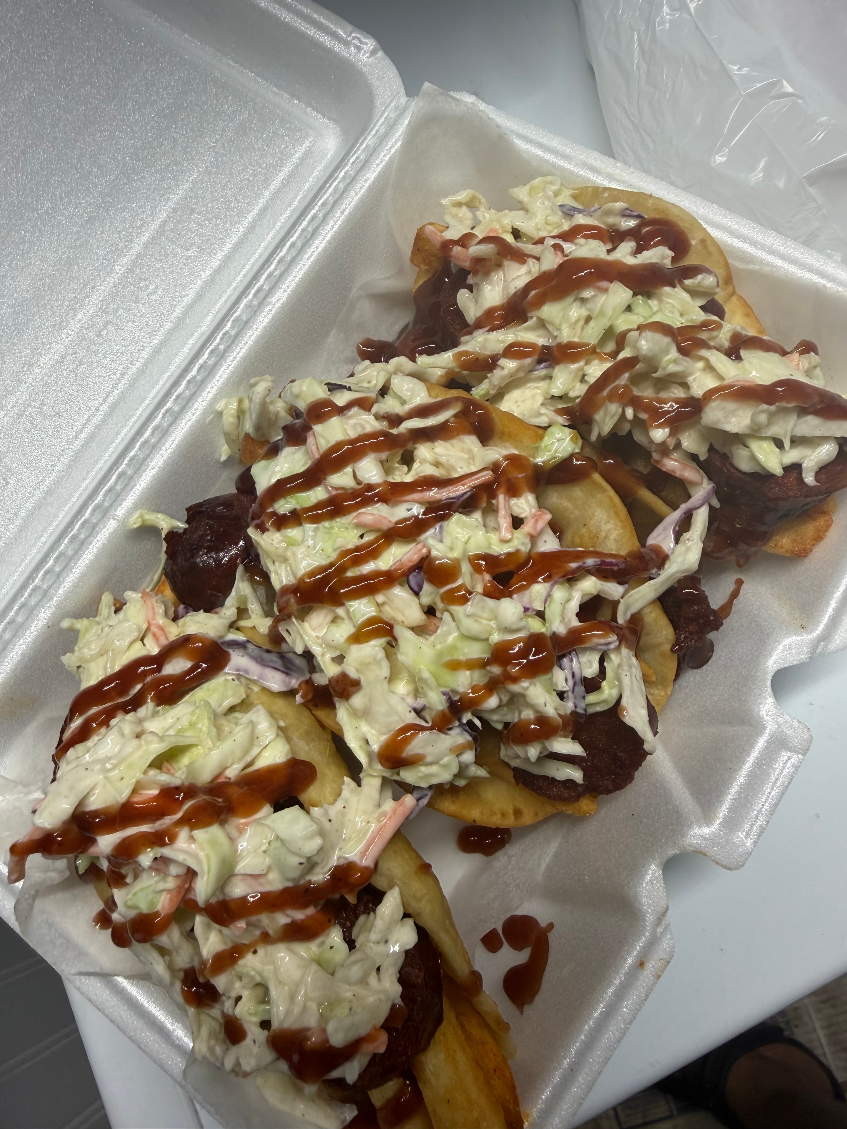 Loaded fries with coleslaw and BBQ sauce